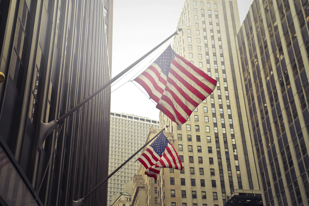 American flag on high buildings
